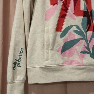 Anthropologie Cream Sweatshirt with Pink, Teal, and Red Graphic
